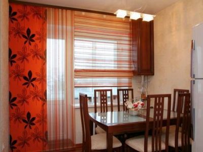 Кухонный интерьер или как выбрать шторы на одну сторону на кухню, а также фото дизайнерских решений
